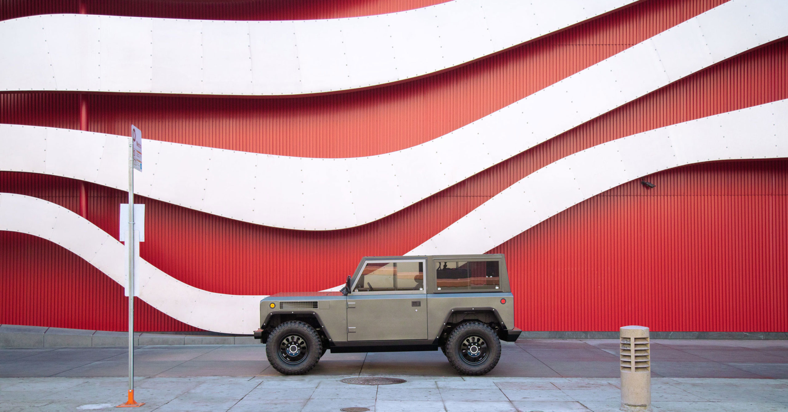 Color photo of the Bollinger B1 Prototype in front of the Petersen Automotive Museum in Los Angeles, California.