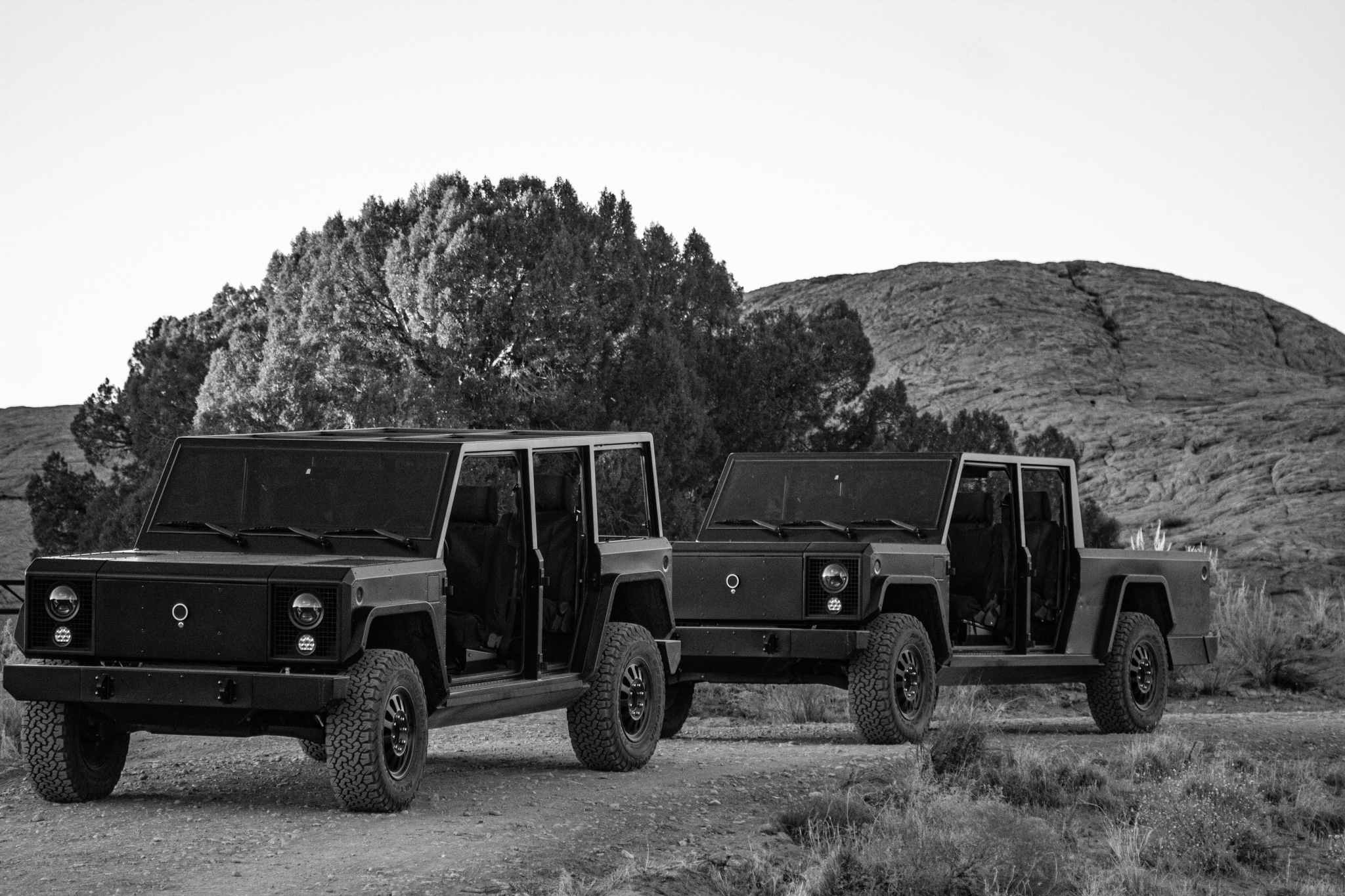 The Bollinger B1 and B2 sitting on the trails in Moab, Utah, with the doors off.